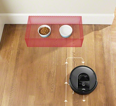 iRobot Roomba i7 is navigating out of the way of objects.
